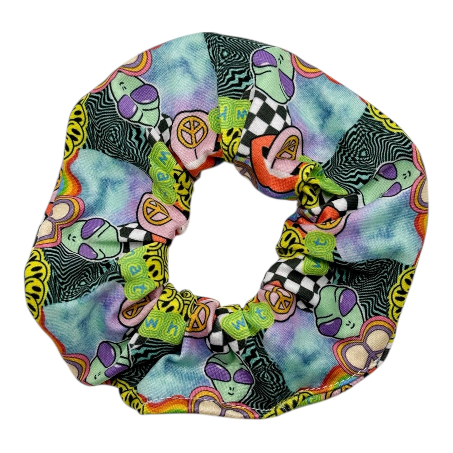 Colorful scrunchie with abstract patterns on a white background