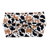 BLACK & TAN COW PRINT - LUXE