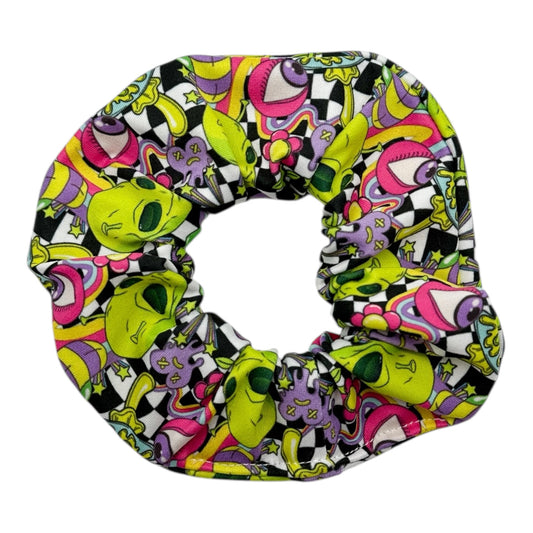 Colorful scrunchie with alien pattern on a white background